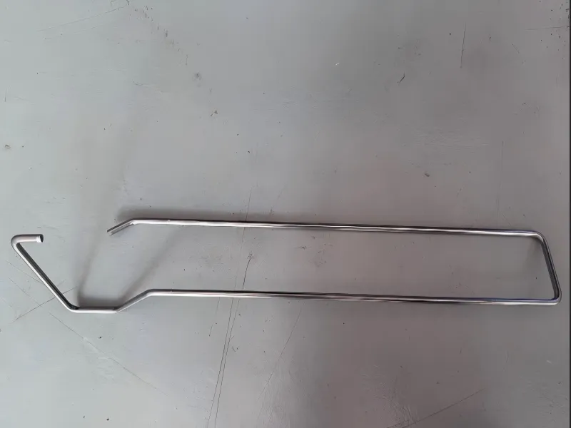 Video showing a flat bar bending machine bending 4mm iron wire for making shelf hooks.